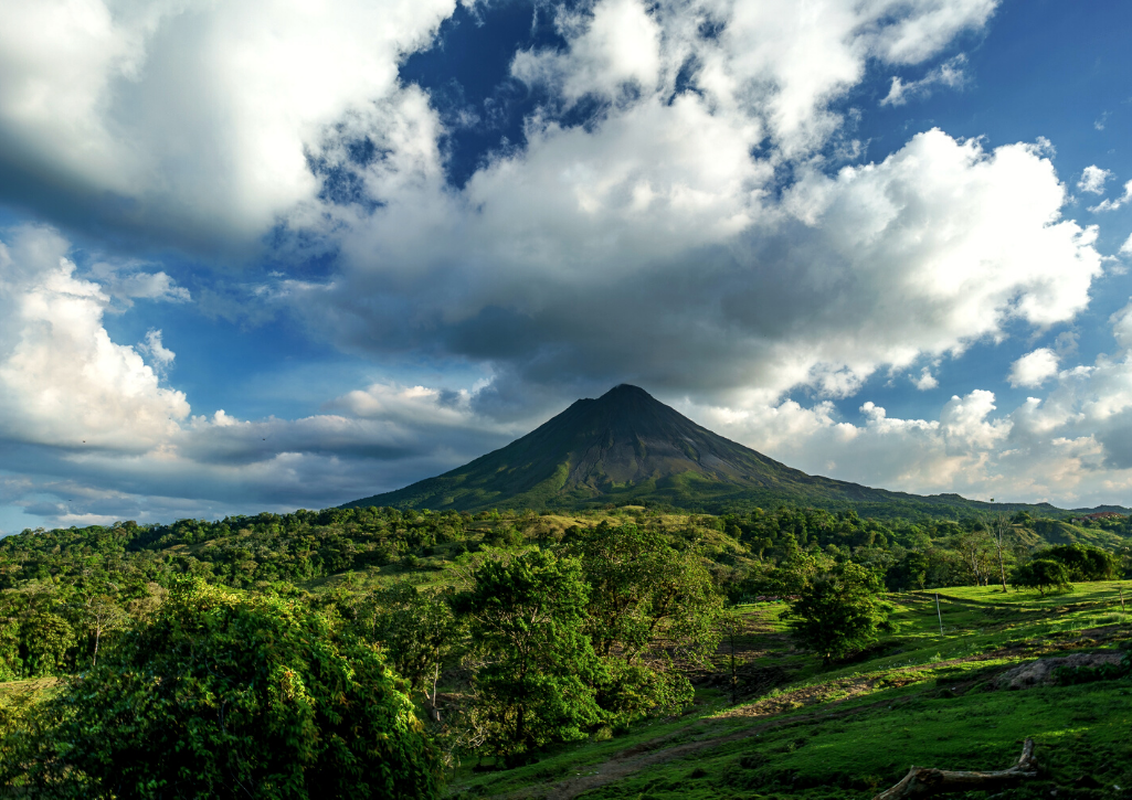 A mountain in Costa Rica with beautiful clouds above it