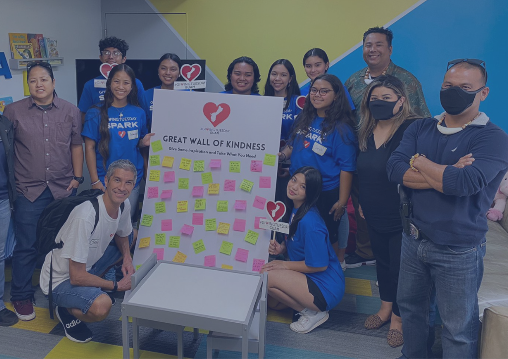 Guam participants holding a kindness sign