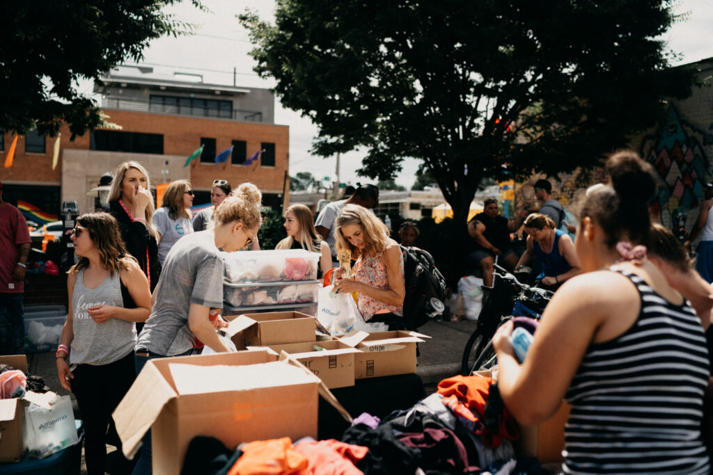 columbus ohio pop up outdoor shop with tables of free coats