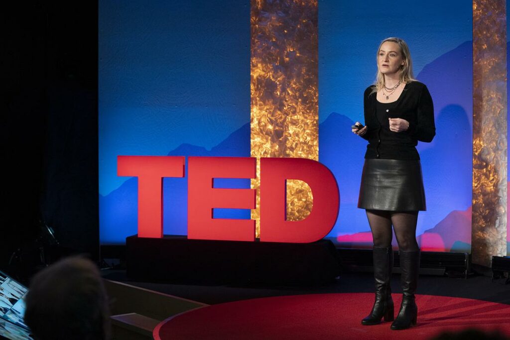 Asha Curran on the TED stage